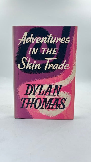 Book cover of 'Adventures in the Skin Trade' by Dylan Thomas with a pink and purple design.
