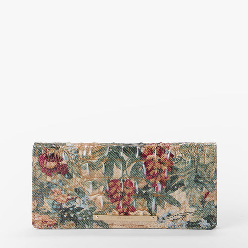 A rectangular wallet featuring a detailed vintage floral tapestry pattern with red flowers, green leaves, and a beige background, set against a plain white studio backdrop.