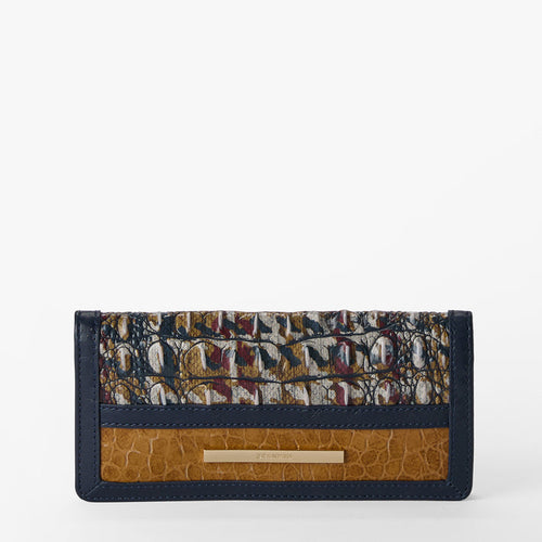 Multicolored patterned Ady wallet with brown leather accents on a white background. Front view.
