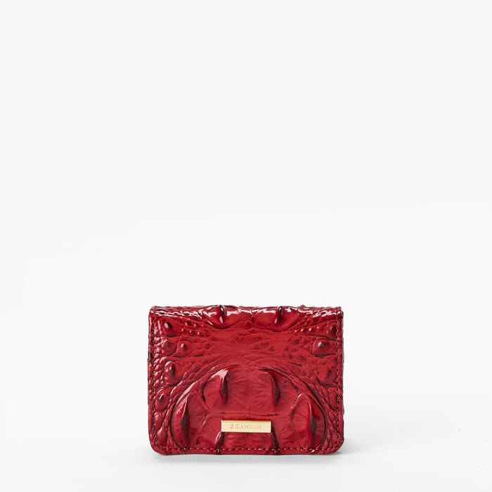 Volcanic Red Melbourne croc textured wallet on a light gray background. Clementine front view.