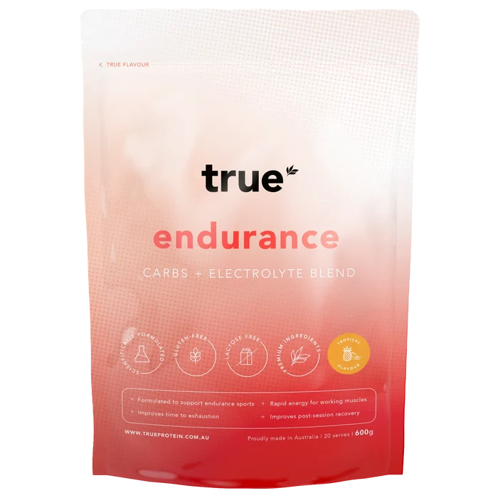 True Endurance carbs + electrolyte blend pouch, 600g tropical flavour, pink-red resealable sports drink powder by True Protein – 20 serves, gluten-free, lactose-free, proudly made in Australia.
