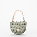 A small green crocodile leather coin purse with a gold-tone chain handle and snap button closure, shown on a clean white background.