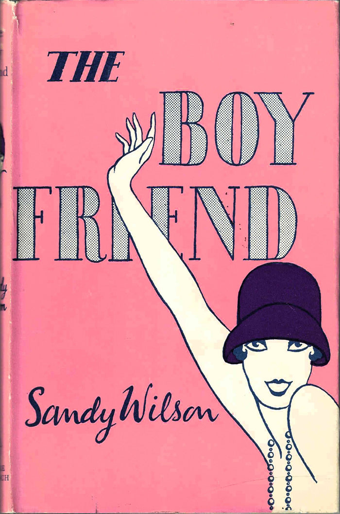 Front cover of 'The Boy Friend' by Sandy Wilson with a stylized illustration of a woman from the 1920's on a pink background.