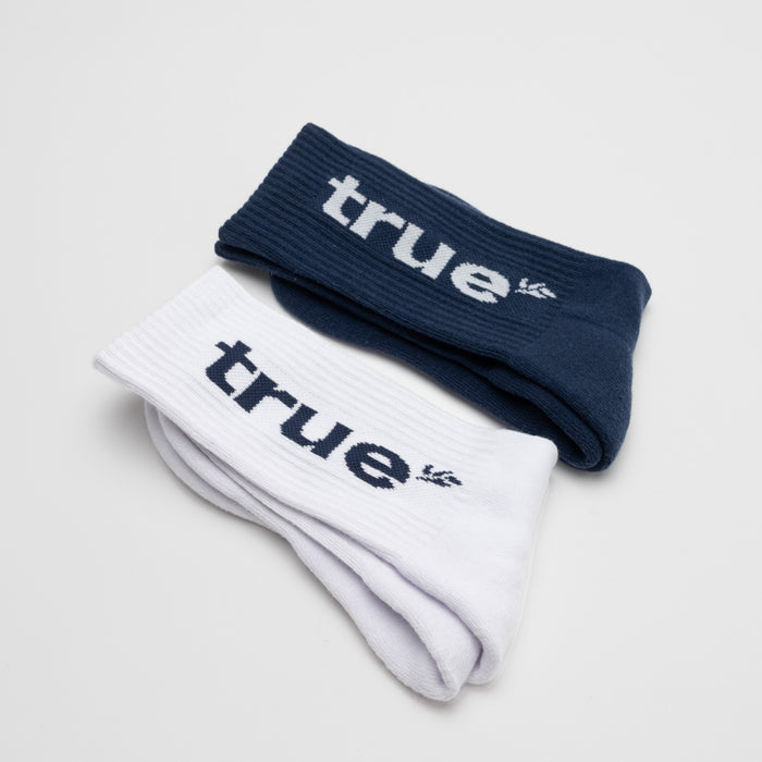 Pair of ribbed crew socks (navy and white) folded on white background, cotton blend unisex athletic socks with "true" logo in contrasting color — navy/white everyday casual socks, 2-pack product image.